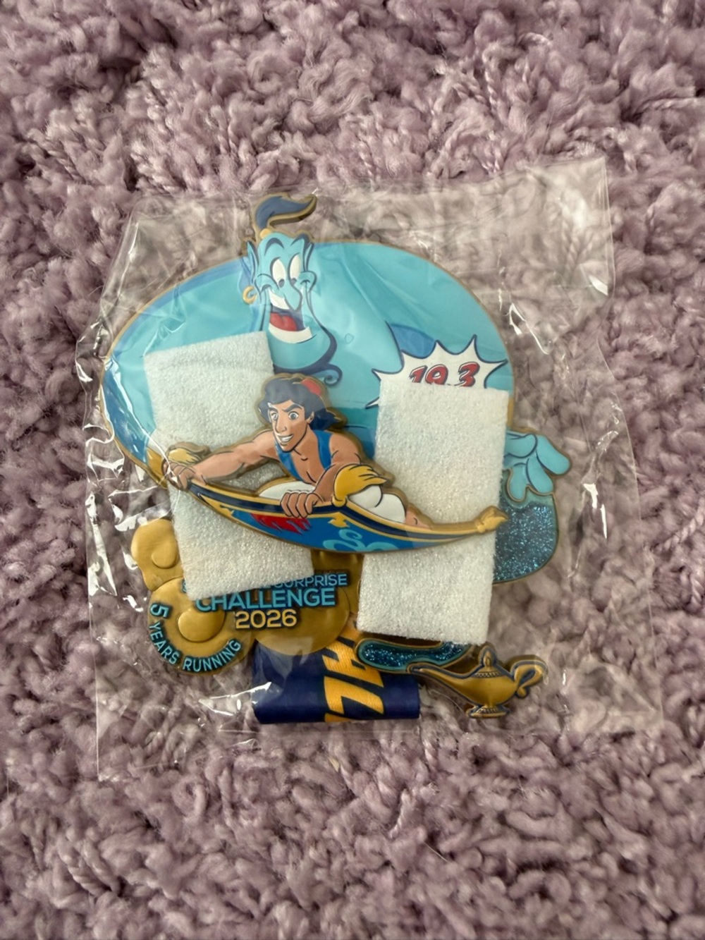 RunDisney Aladdin Genie springtime surprise challenge medal 2026